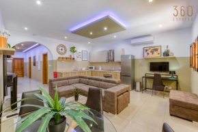 Modern 2BR Apt with backyard in vibrant St Julians by 360 Estates